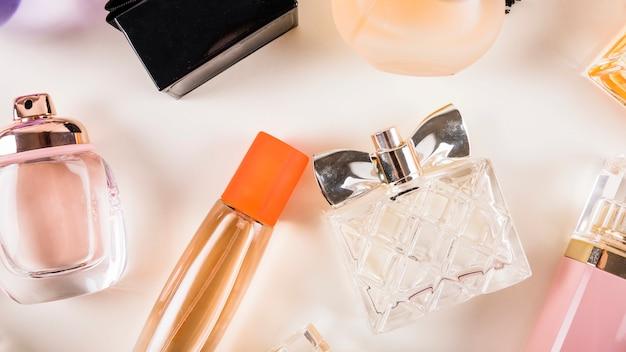 Assorted perfume bottles on a light background.